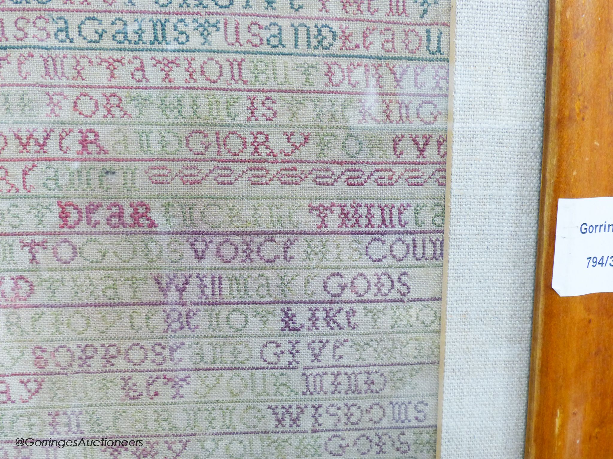 A George II needlework sampler, worked with the Lord's Prayer and religious text, by Alice Wood, dated 1736, 40 x 20cm